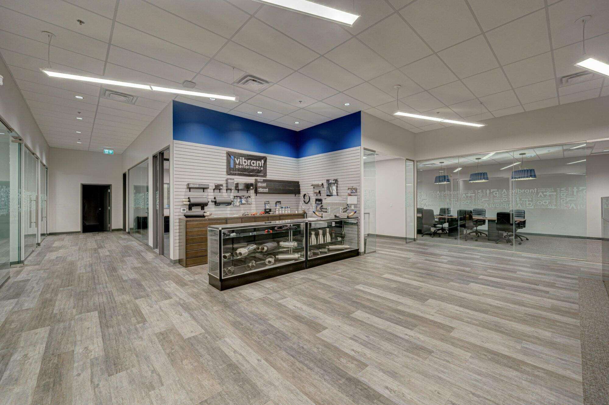 An image of a reception area with a blue and white wall